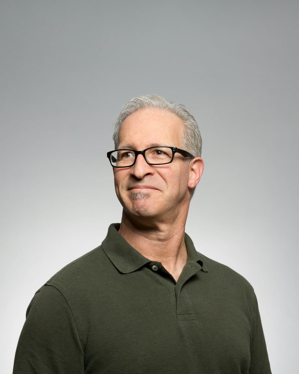 Portrait of Thomas Wren, managing partner, against a plain grey backdrop